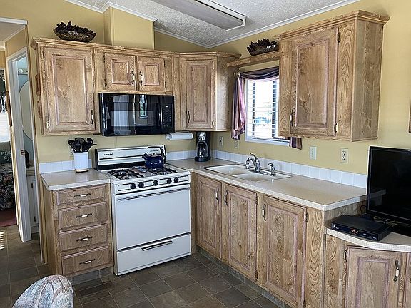 5th image of 6649 E 32nd St #213