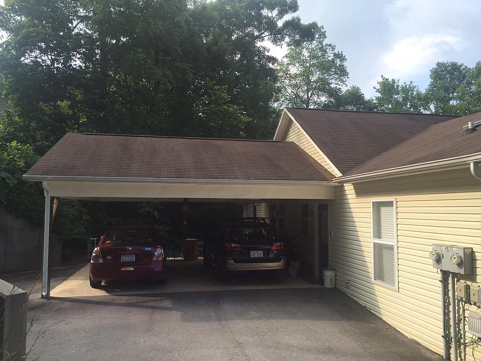 Large oversized shared carport. No step entry into unit. 2nd