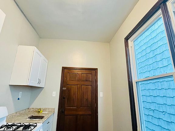 Unit opens into the kitchen