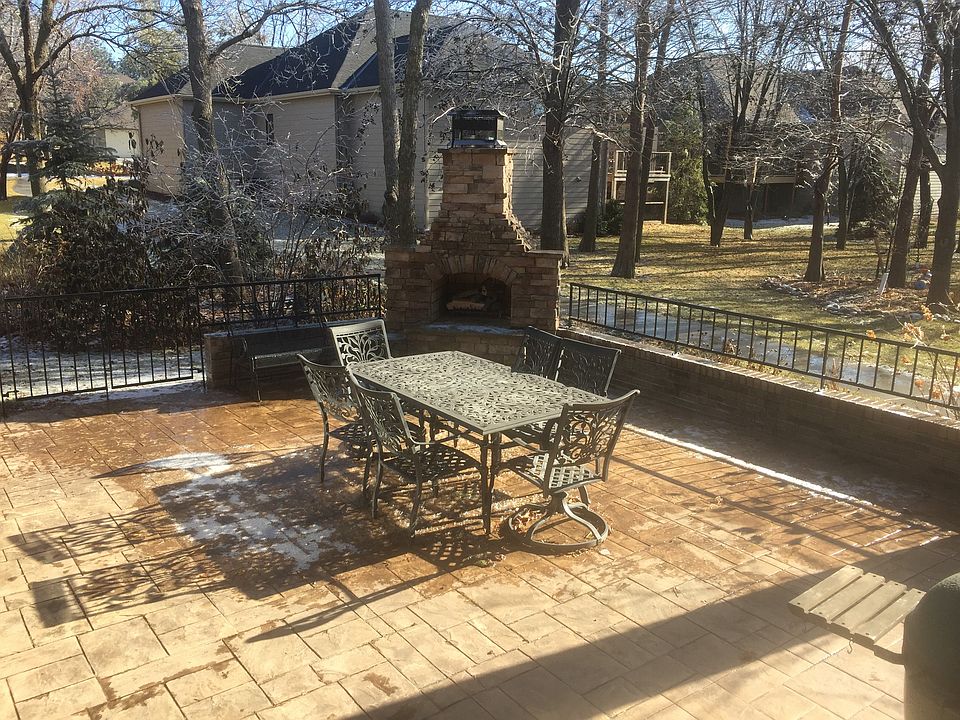 Patio with fireplace