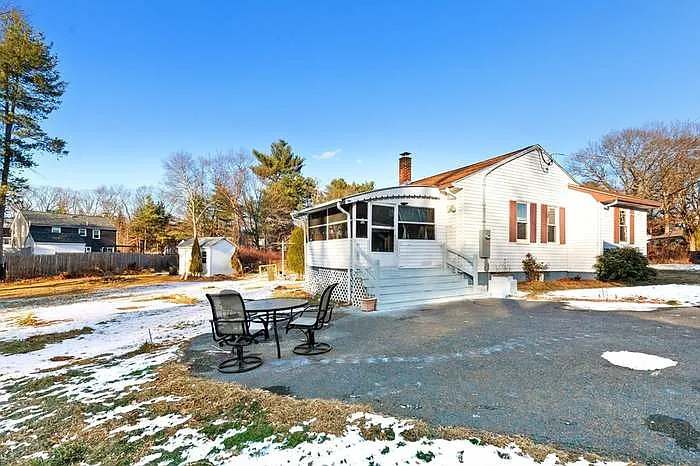 View from driveway, showing screen porch