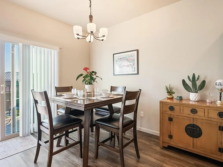 Dining area, table expands to seat 6.