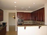 Gorgeous Cherry and Granite Kitchen-Stainless GE Profile Appliances-Backsplash