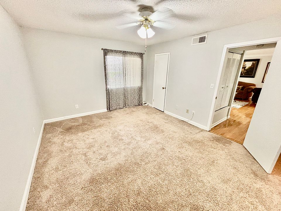 Spacious master bedroom with two closets