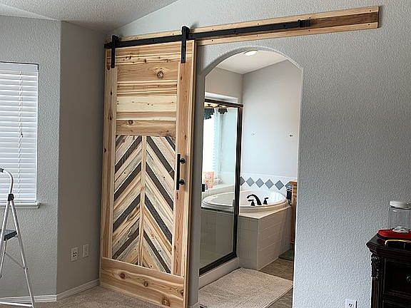 Sliding barn door in master 