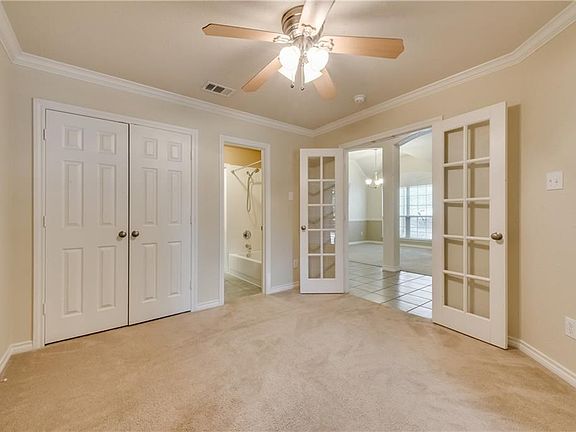 This 4th bedroom can be set up as a study or a guest room with bath access.