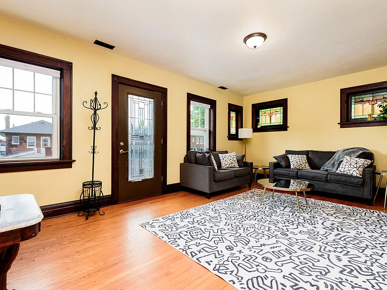 Living Room with door to front balcony