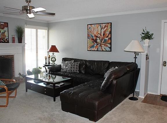 Wonderfully sized living area with wood burning fire place which has been updated. Plantation shutte