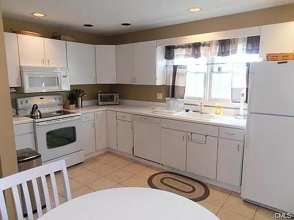 Kitchen, stove and cabinets