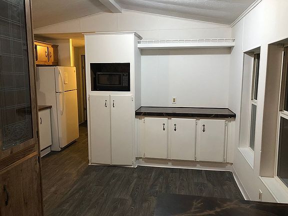 Microwave (black) and Dining