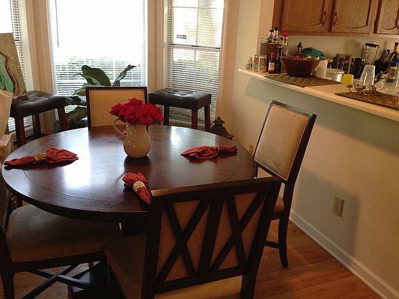 The dining area is connected to the kitchen and living area
