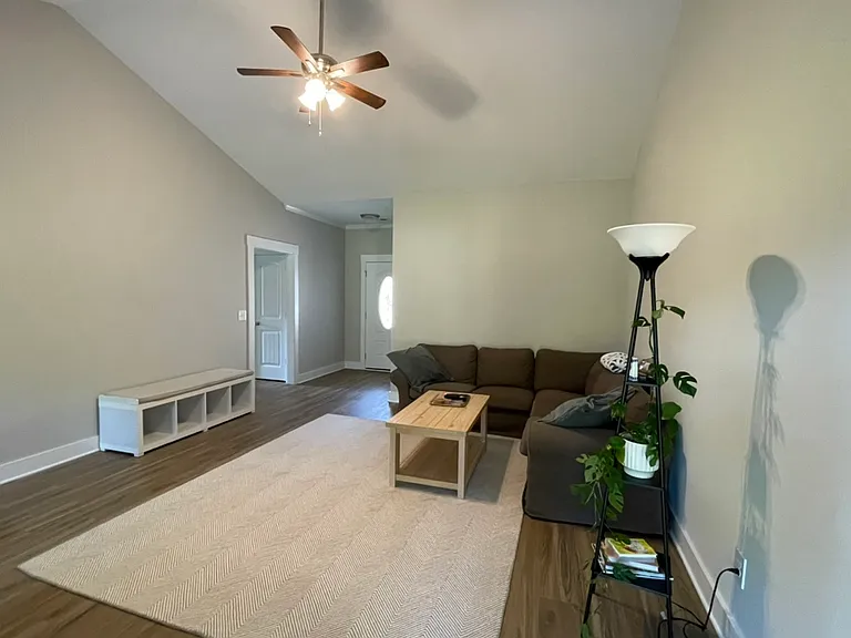 Living room with view back to foyer.