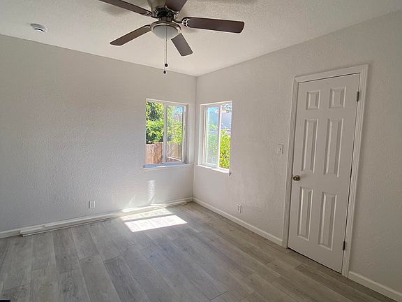 Bedroom- fresh painting, new floor,new ceiling fan