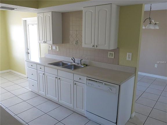 Updated kitchen with tile back splash.