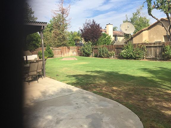 Nice fenced in yard with covered patio