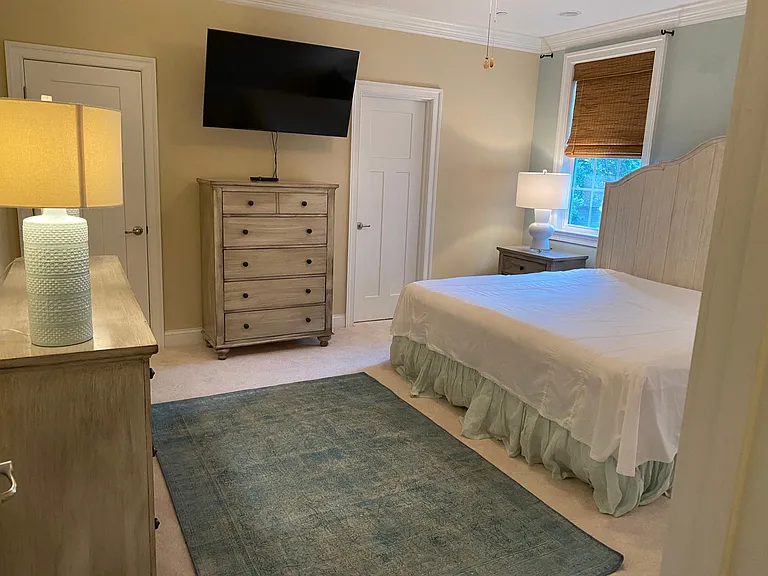 Master bedroom. Door on right leads to bathroom. Door on left leads to walk in closet.