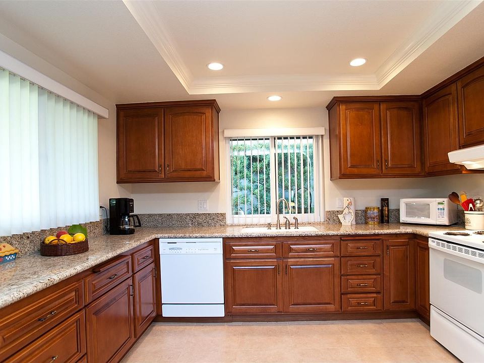 Updated Kitchen with granite counters, custom cabinets