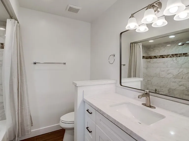 Two bedroom 1.5 bathroom beautifully upgraded with in unit laundry at the beach. Open House July 12 — Photo 18