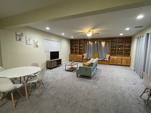 Spacious living/dining area with window nook