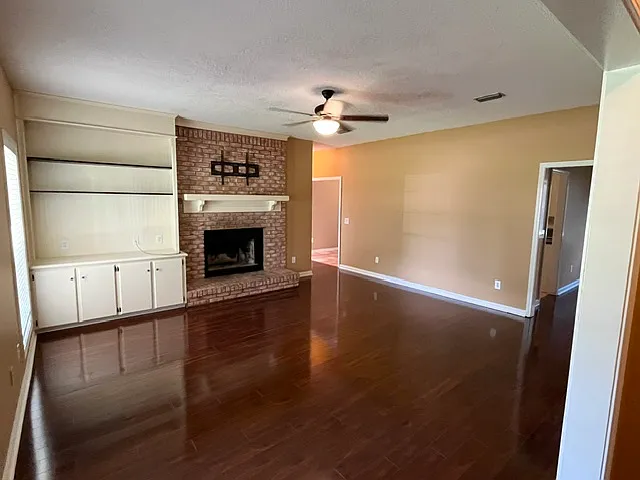 Living room with built-in shelves and storage