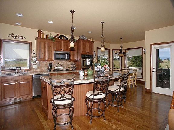 Gourmet kitchen offers granite counters, knotty alder cabinets, and much more!