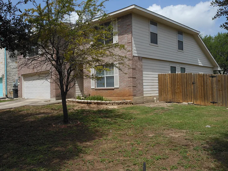 Side/Front of home. Large Corner Lot