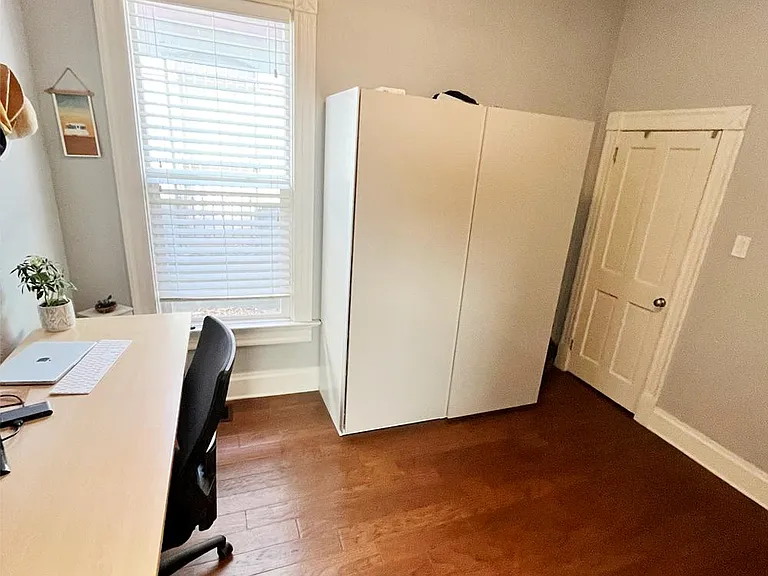 The second bedroom makes a perfect office. The Ikea wardrobe (pictured) is included to give you ample closet space.