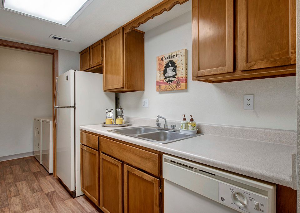 Windtree Kitchen With White Appliances