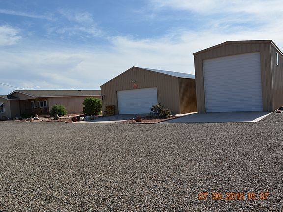 6 CAR GARAGE + 40FT RV GARAG