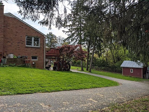 Side of house and shed