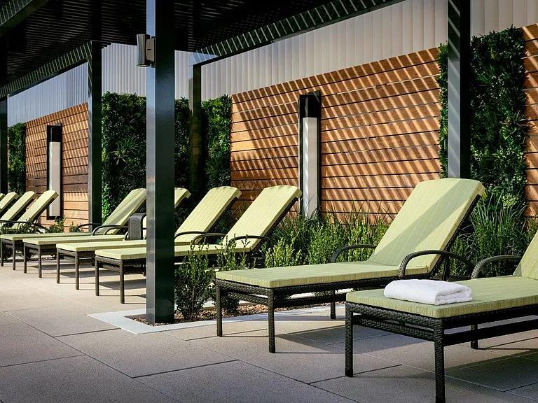 Outdoor rooftop pool for Life Time athletic resort members