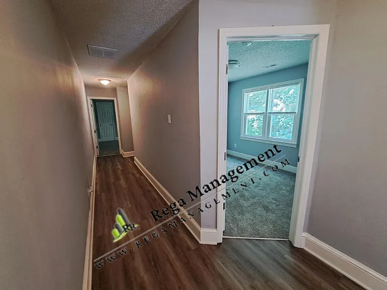 Upstairs has 3 bedroom and 1 Full Bath - with deck off Primary Bedroom