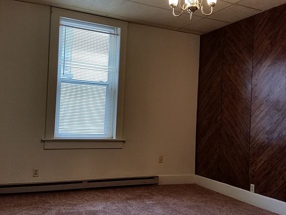 Living room (paneling is currently behind the wallpaper)