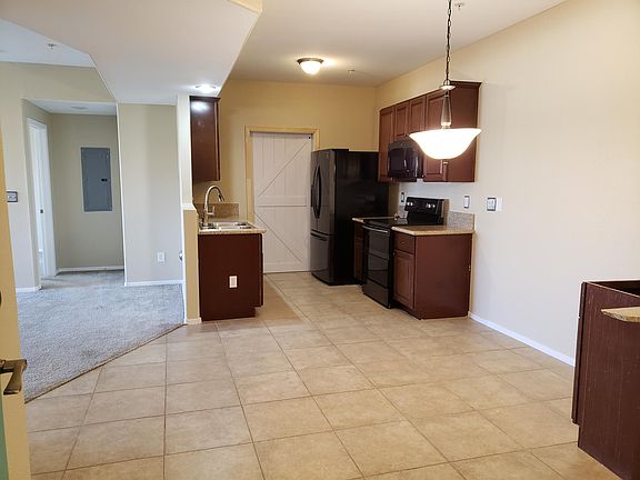 Large open entry to the dining room, living room and kitchen.