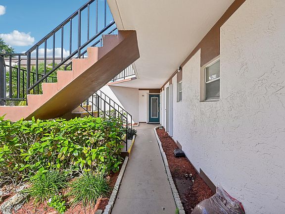 2nd image of 7 N Greenway Village N #111