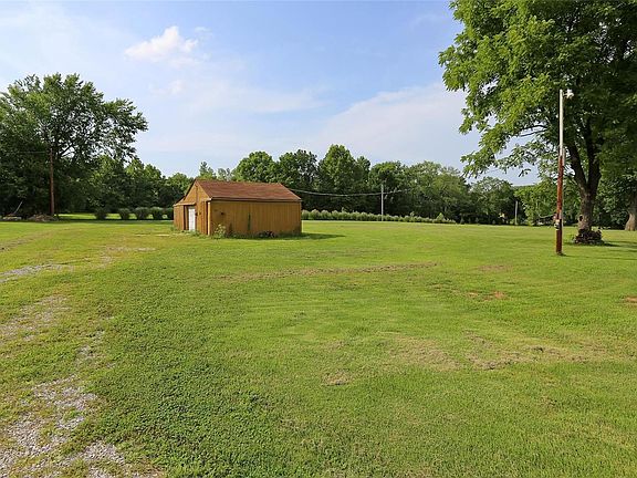 Back yard with large shed.