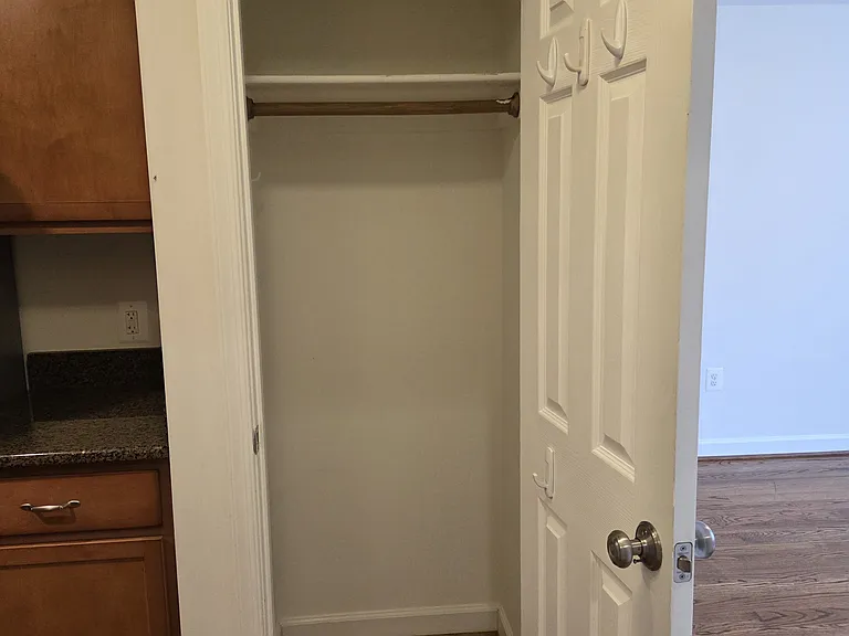 Closet between kitchen and living room