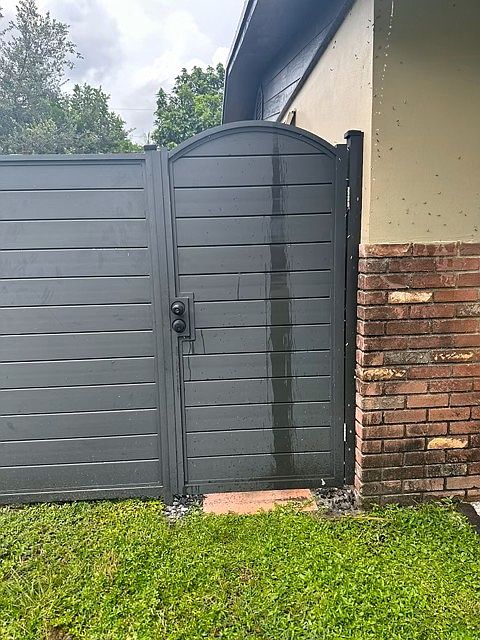 entrance gate to the door of the apartment - it has a lock with key