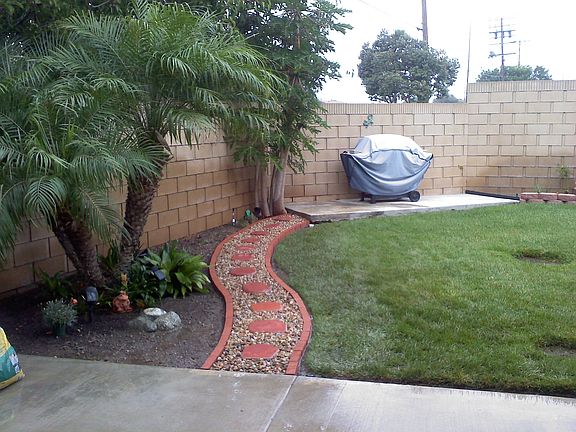 Backyard with new walkway 