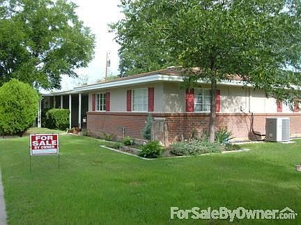 Outside : on oversized corner lot, landscaping with sprinkler system & solar lighting