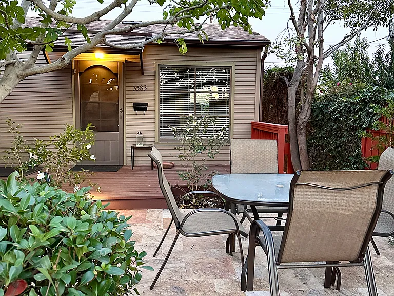 wooden deck and travertine patio
