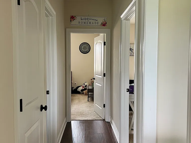 hallway between three rooms (master bedroom on the other side of house)