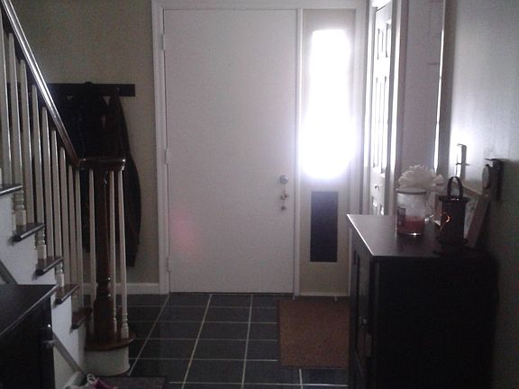 Foyer with ceramic tile