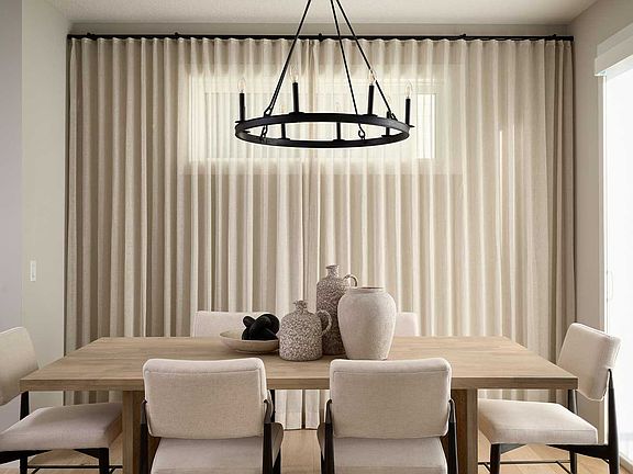 A photo of the dining area in the Purcell 26 show home in Calgary by Brookfield Residential
