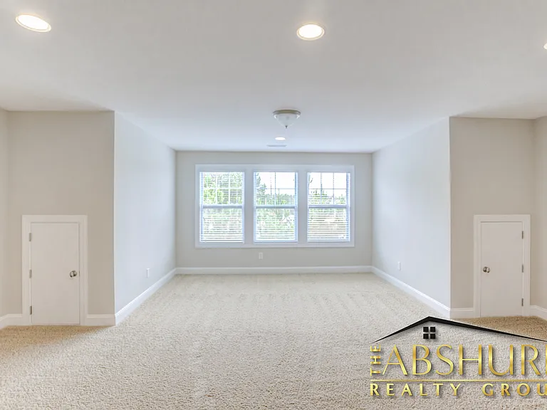 3rd floor suite with walk in closet, full bathroom, additional storage and efficient recessed lights