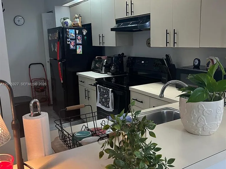 8660 SW 212th St #306 — Photo 6