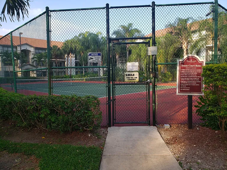 Tennis court is well-maintained.