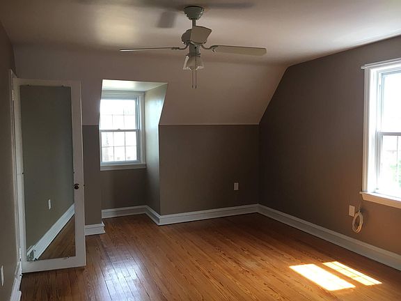 Master bedroom. Closet door with mirror. Dormer window faces south.