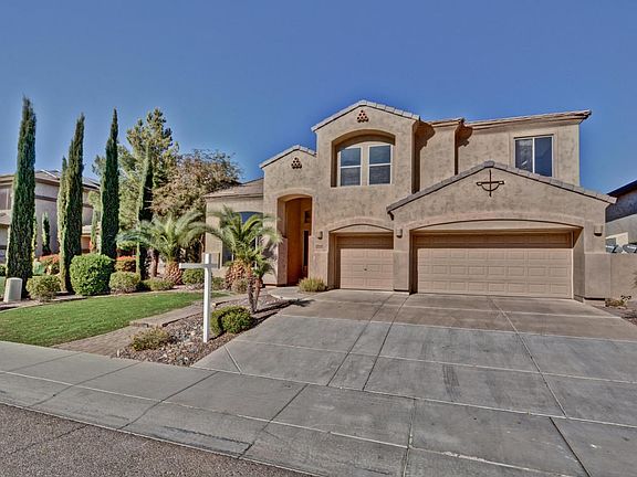 Front of Home with 3 Car Garage