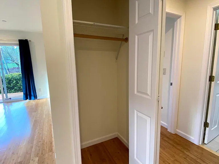 Coat closet for additional storage (opposite to the laundry room)